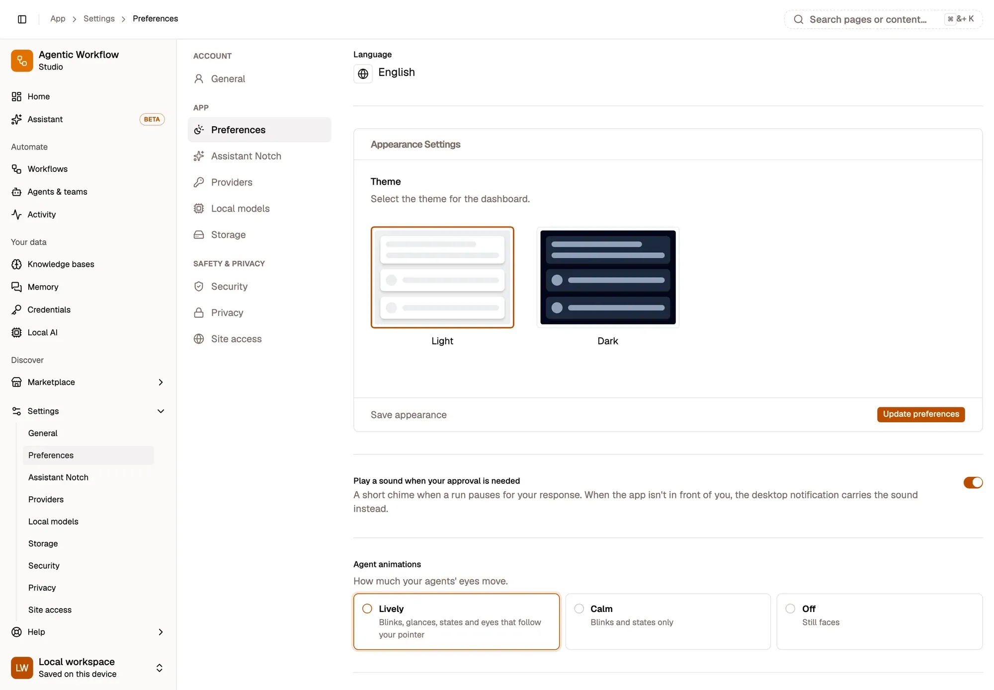 Settings, Preferences, in a local workspace: Language (English) with its Change language button, the Appearance Settings card with the Light and Dark theme choices and an Update preferences button, the Play a sound when your approval is needed switch (on), and Agent animations with Lively (selected), Calm and Off.